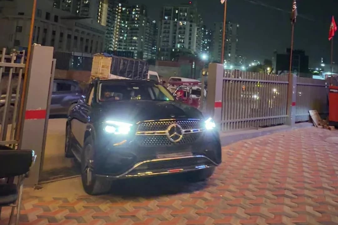 Premium SUV ready for customer delivery outside THE CAR O CARE at night