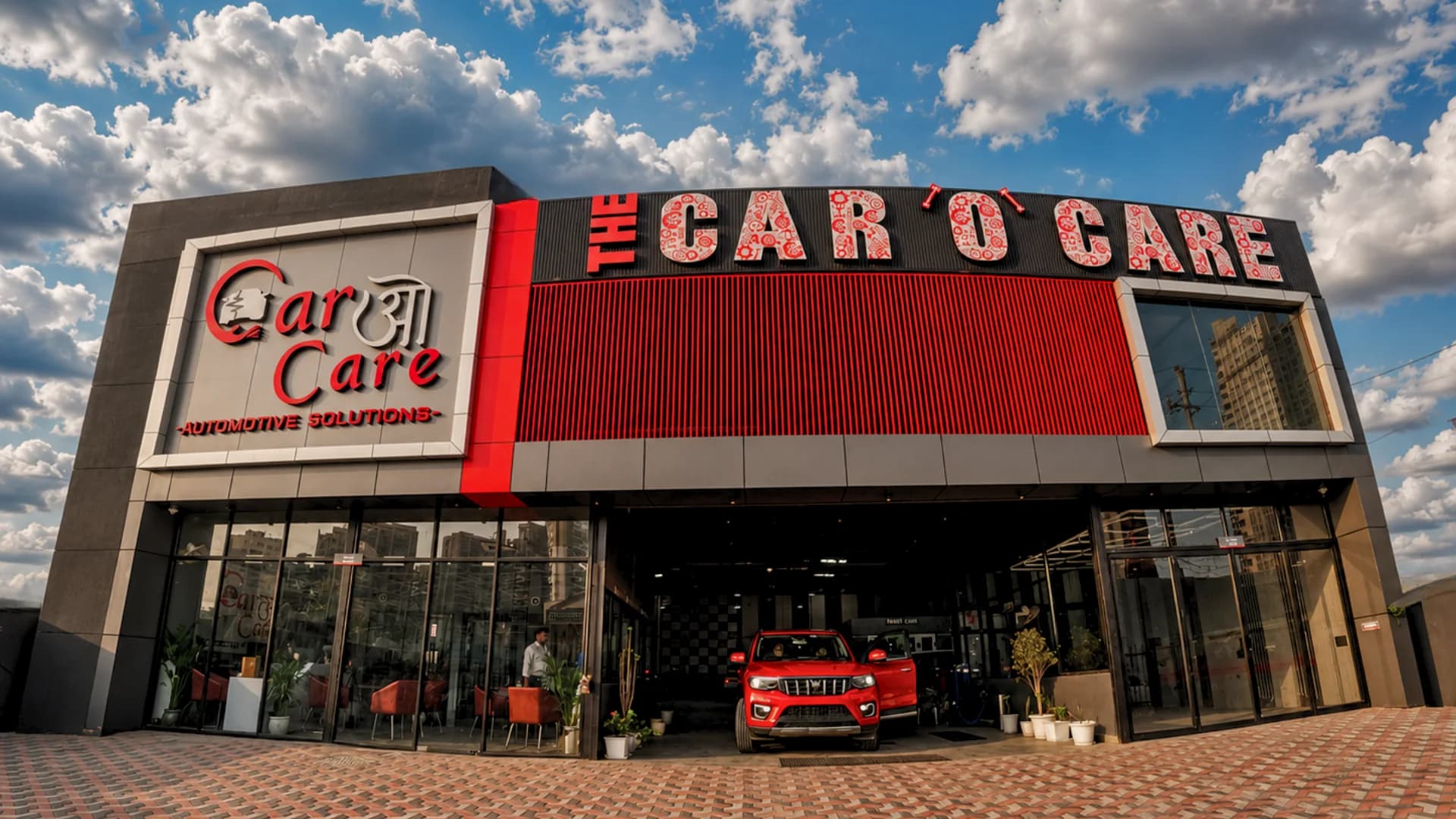 THE CAR O CARE branded workshop exterior and service entrance in Noida
